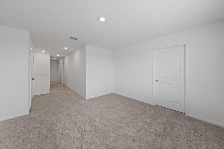 One of the many benefits of living in the Torres plan is the additional space of the upstairs game room. Enjoy this functional room as a game room, home office, a play room for the kids or a second living room.