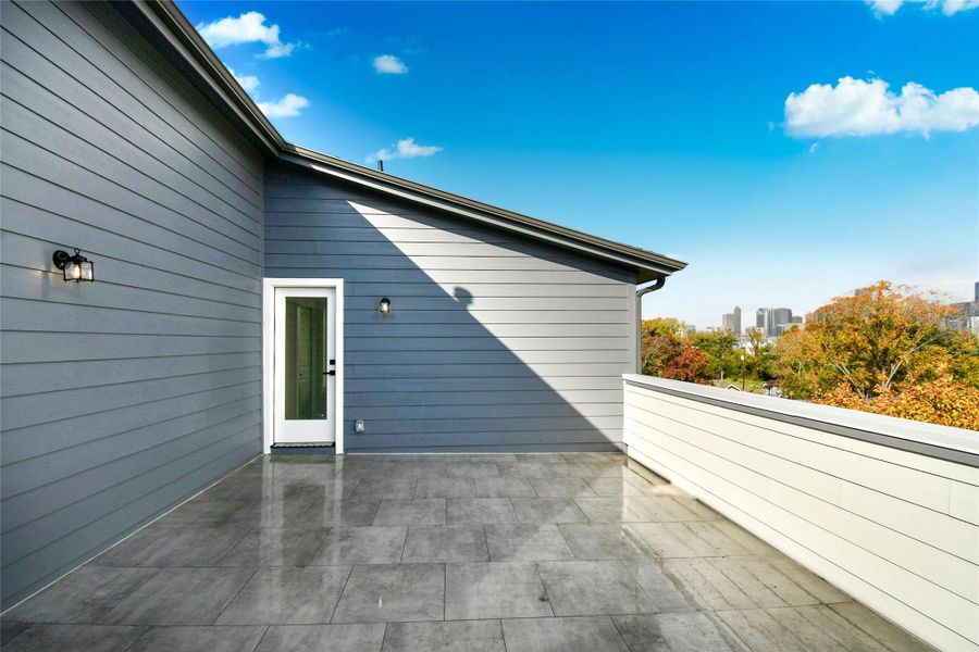Exterior details and patio area of a home in , Houston (Image 3).