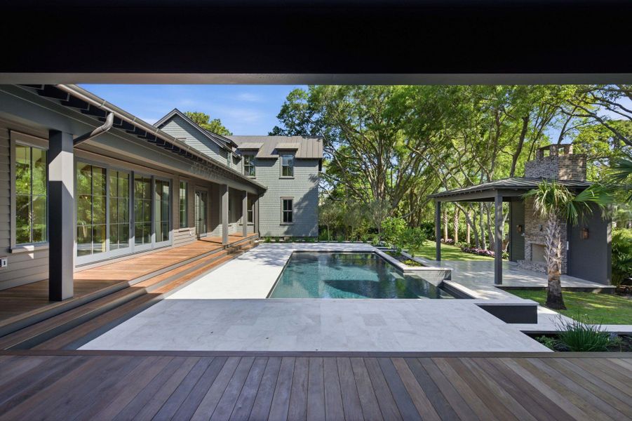 Exterior details and patio area of a home in , Sullivan's Island (Image 23).