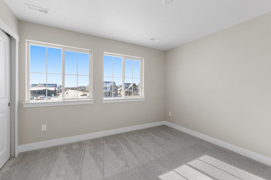 Spacious, unfurnished interior of a new home in Trailside on Harmony, Timnath (Image 52).