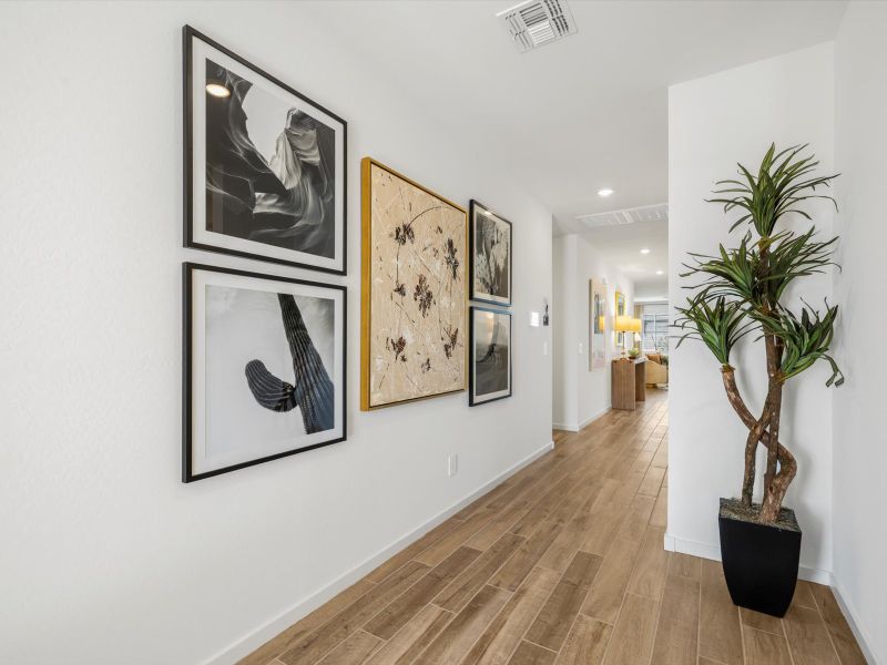 Furnished interior view inside a new home in Meritage Homes by Teravalis - Reserve Series, Buckeye (Image 19).