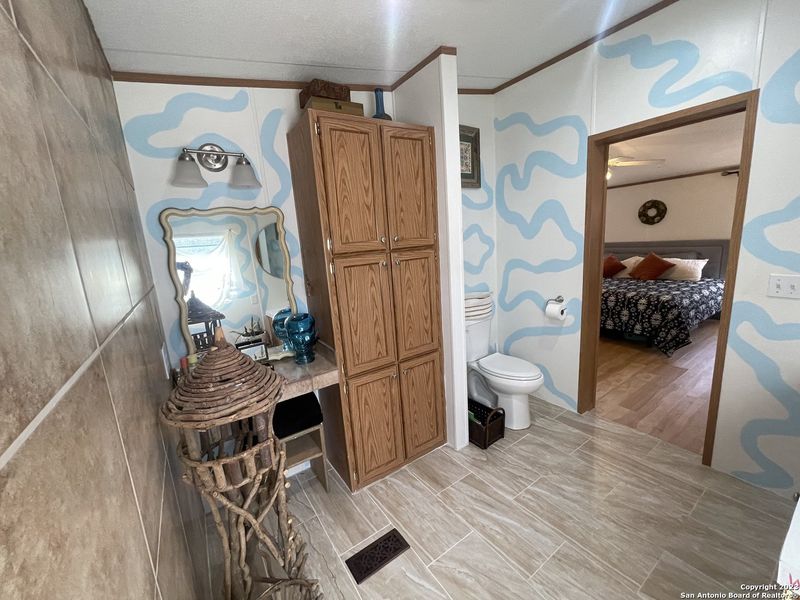 Furnished interior view inside a new home in , Bandera (Image 32).