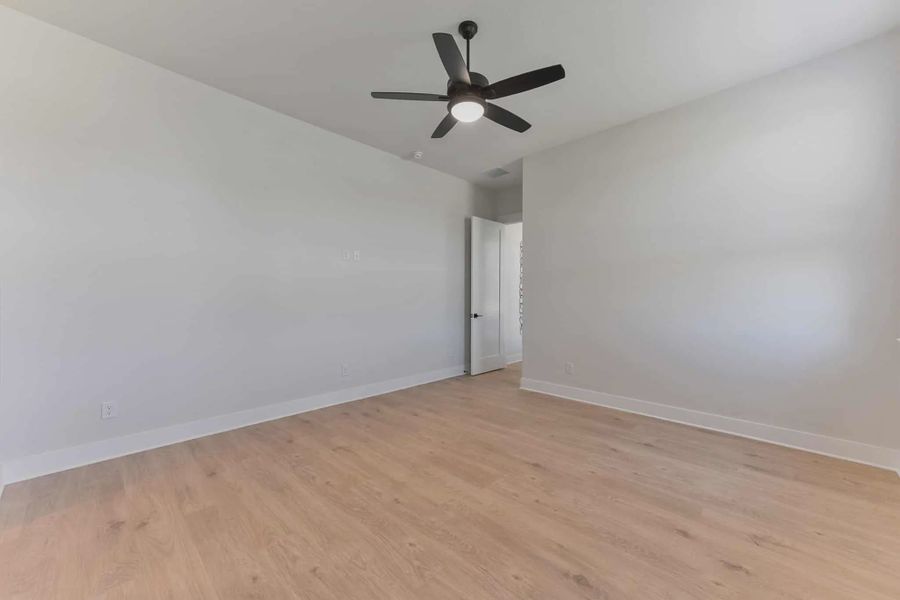 Representative unfurnished interior of a home built from the Franklin by Chesmar Homes in Feathergrass, Fulshear (Image 20).