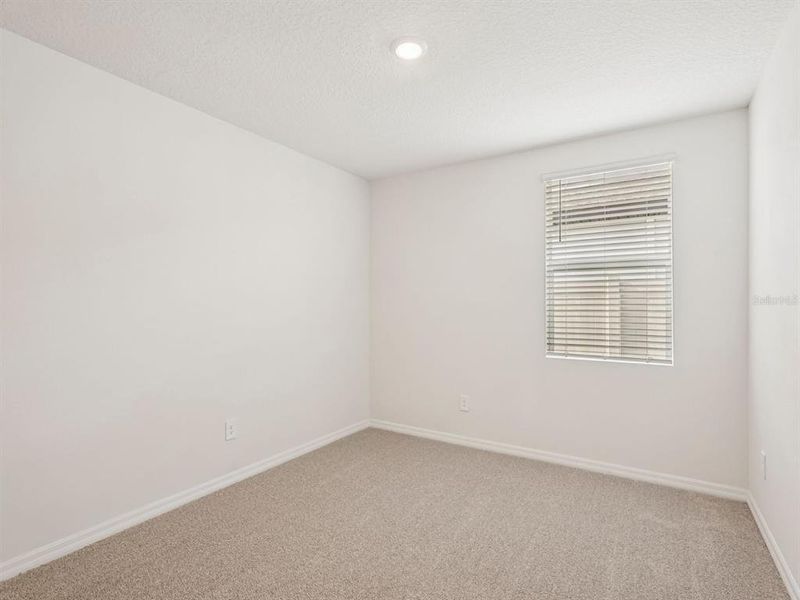 Spacious, unfurnished interior of a new home in Two Rivers - Classic Series, Zephyrhills (Image 12).