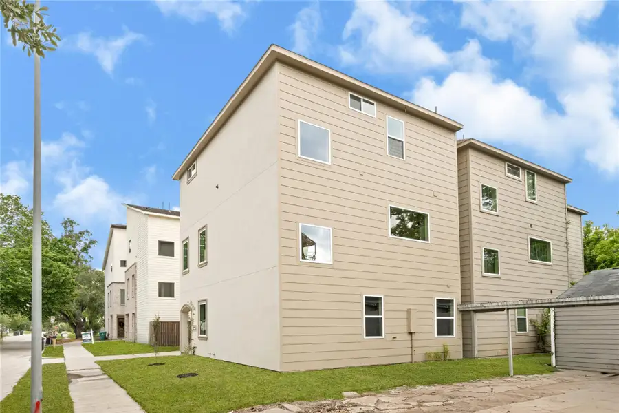 Exterior details and patio area of a home in , Houston (Image 3).