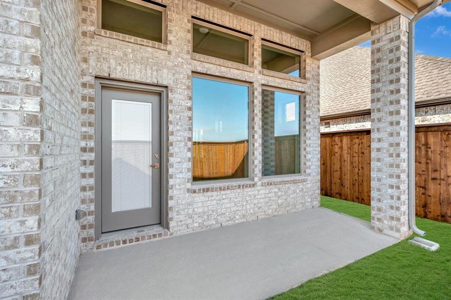Exterior details and patio area of a home in Creekshaw – Gardens, Royse City (Image 2). Exterior details and patio area of a home in Creekshaw – Gardens, Royse City (Image 2).
