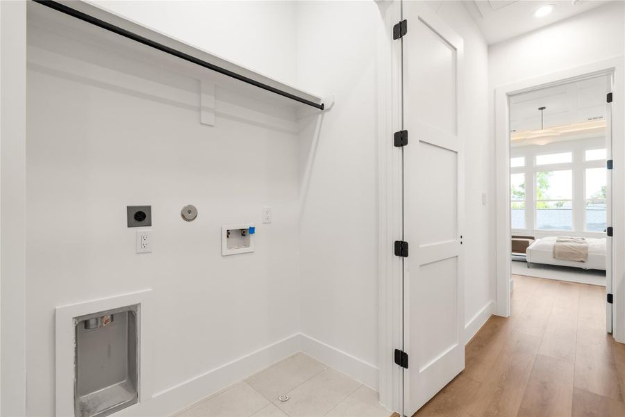 Tucked conveniently near the bedrooms, this dedicated laundry space means fewer trips up and down stairs and one less chore that eats into your day. It's a small convenience that makes a real difference in how a home actually lives.