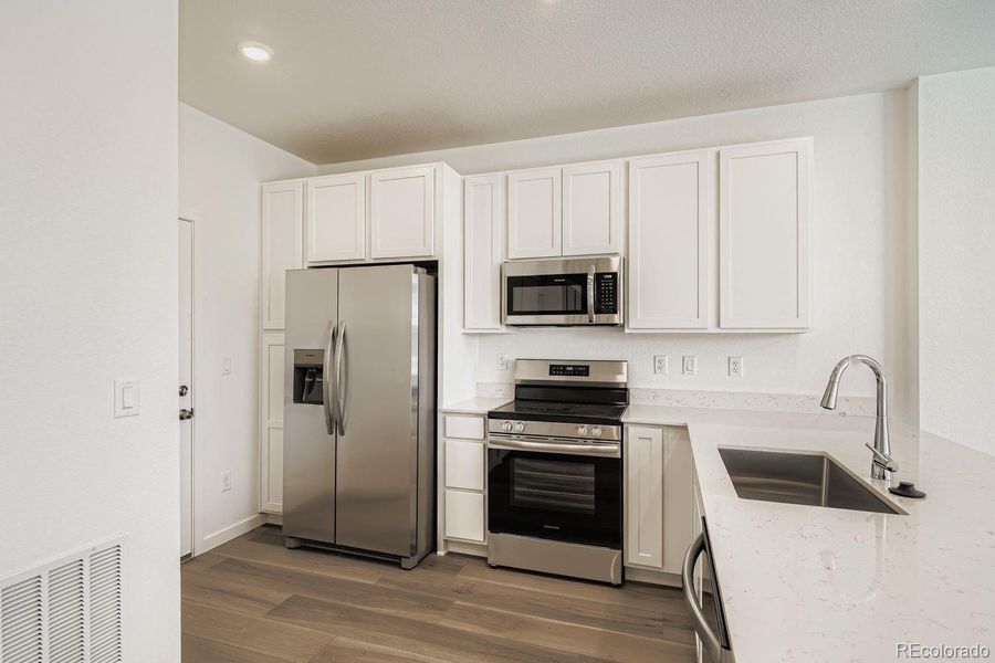 Furnished interior view inside a new home in Parterre: The Parkside Collection, Thornton (Image 3). Furnished interior view inside a new home in Parterre: The Parkside Collection, Thornton (Image 3).