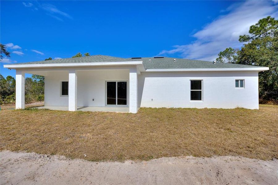 Exterior details and patio area of a home in , Indian Lake Estates (Image 17).