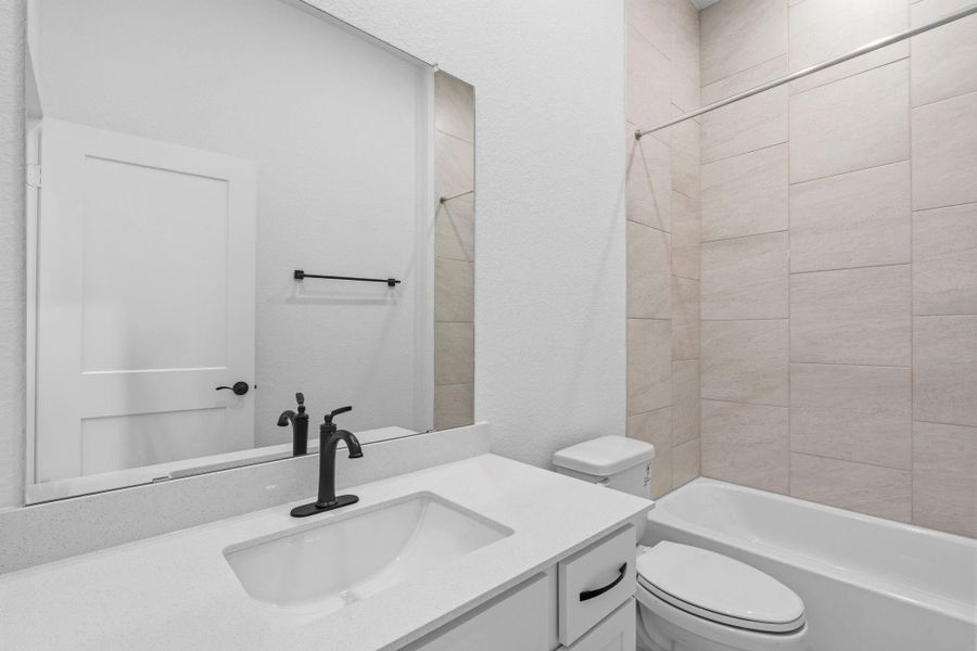 Furnished interior view inside a new home in Wildrye, Waller (Image 9).