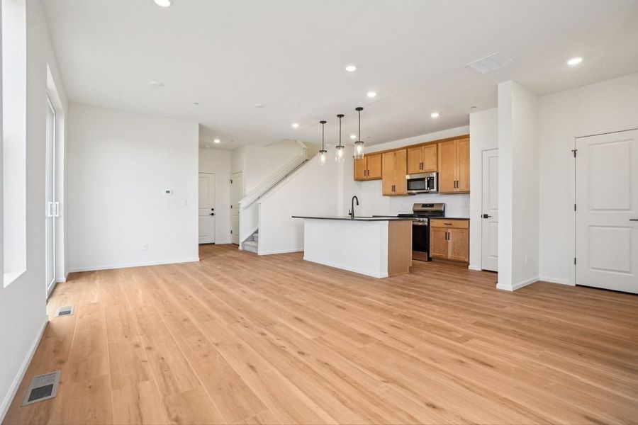 Spacious, unfurnished interior of a new home in The Nest Villas at Canyon Creek, Erie (Image 7).