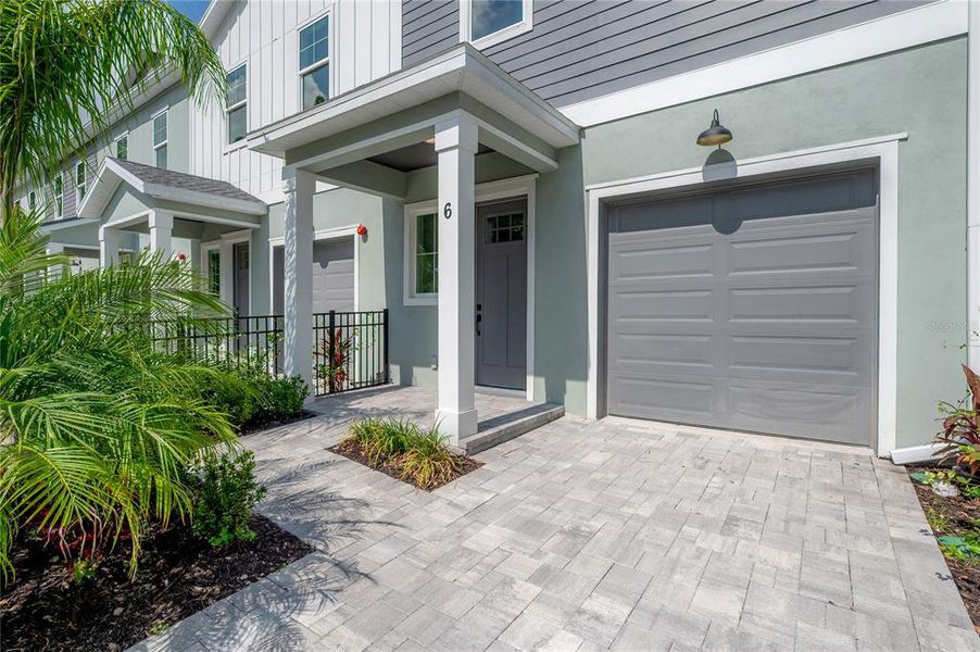 Front exterior of a new home in , Tampa, FL, highlighting curb appeal (Image 1).