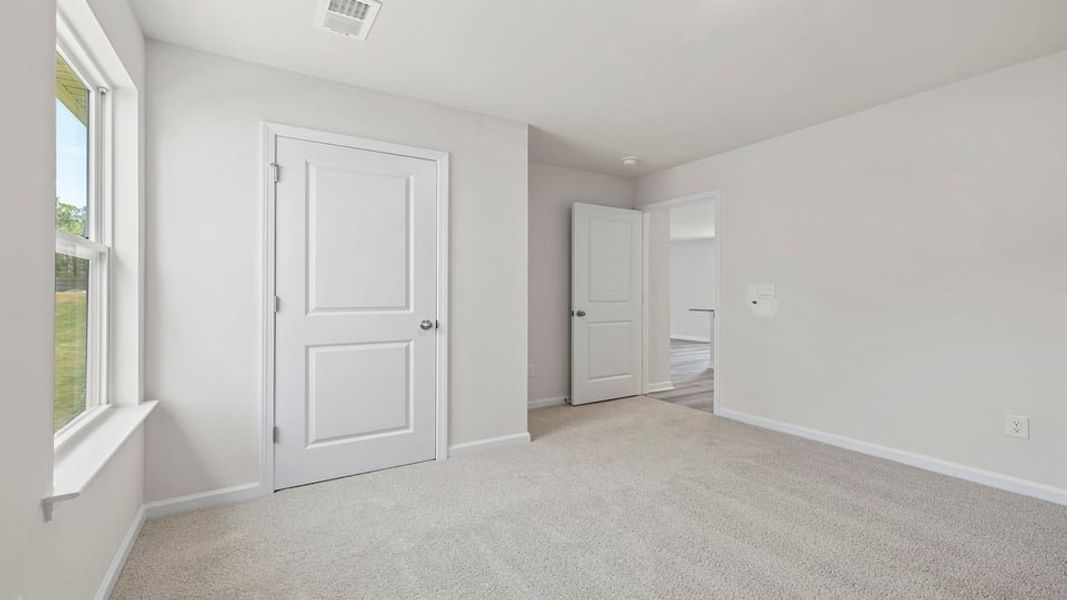 Spacious, unfurnished interior of a new home in Varner Station, Woodruff (Image 22).