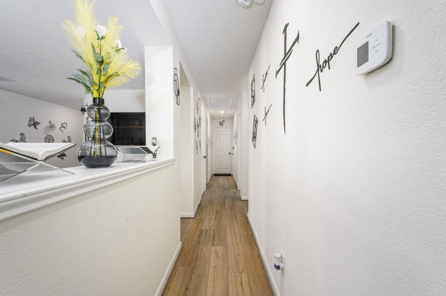 Hallway to spare bedrooms