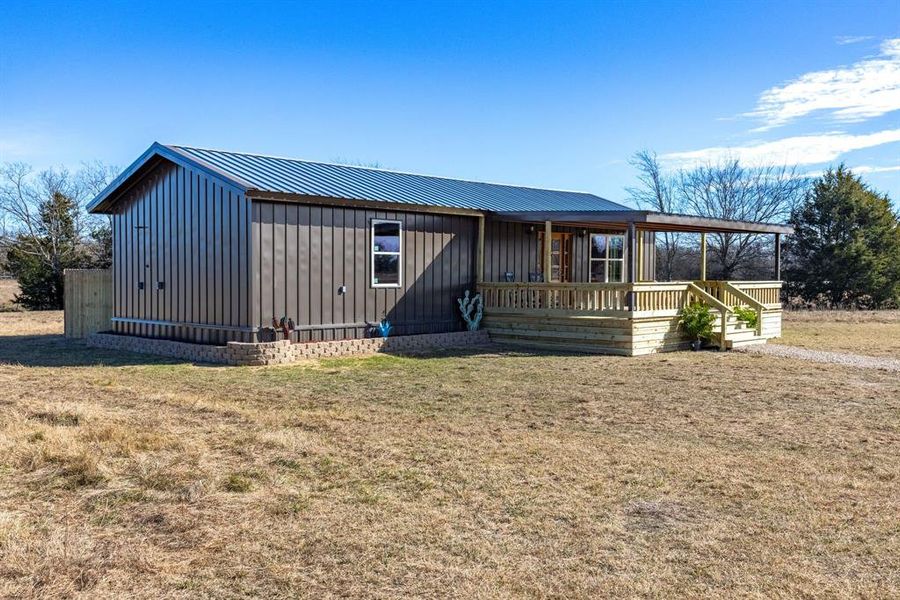 Exterior details and patio area of a home in , Point (Image 12).