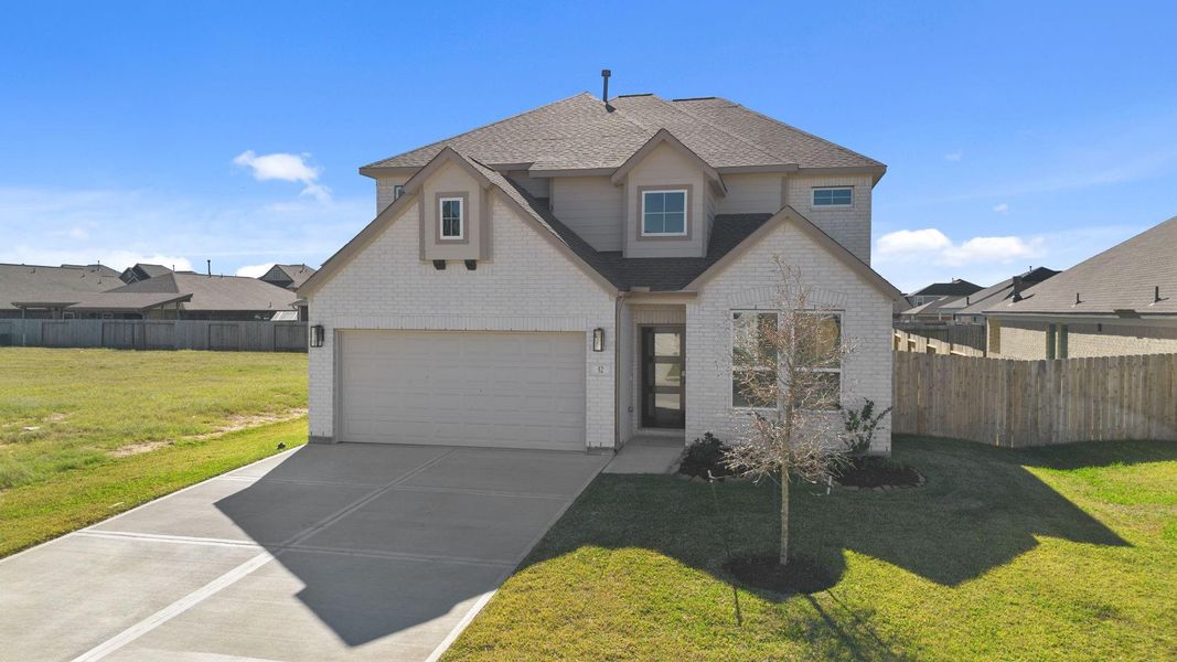 Front exterior of a new home in Beacon Hill, Waller, TX, highlighting curb appeal (Image 14).