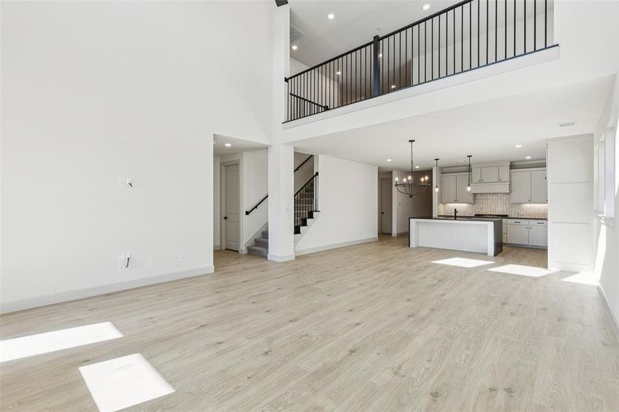 With gorgeous open railing in the game room overlooking the family room, you'll enjoy multi level entertainment zones in this wonderful home!