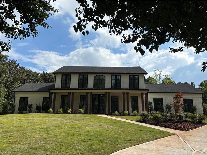 Front exterior of a new home in , Roswell, GA, highlighting curb appeal (Image 1).