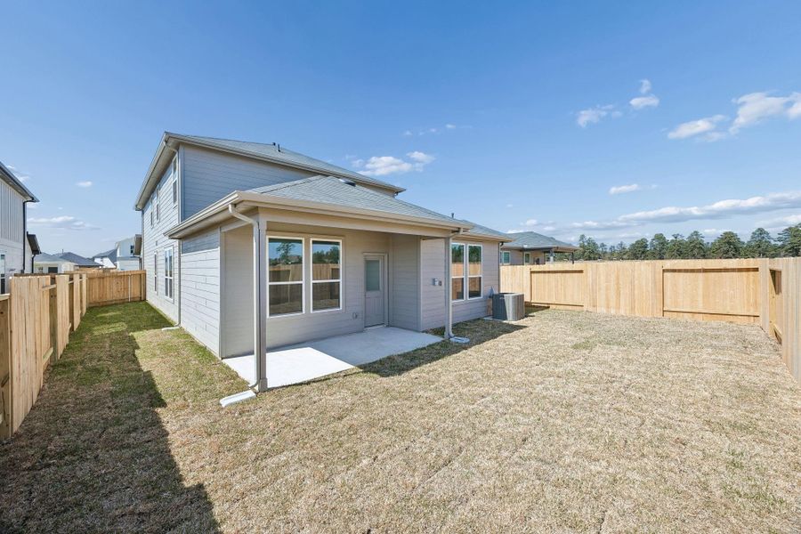 Exterior details and patio area of a home in Montgomery Bend, Montgomery (Image 4).