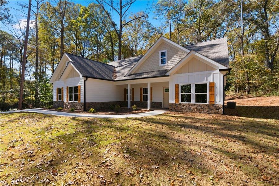 Front exterior of a new home in , Bowdon, GA, highlighting curb appeal (Image 18).