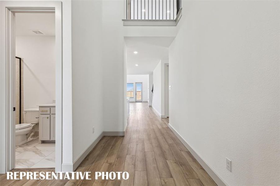 With sight lines from the front through to the rear of the home, this wonderful entry is the perfect place to welcome friends and family into your new home!  REPRESENTATIVE PHOTO