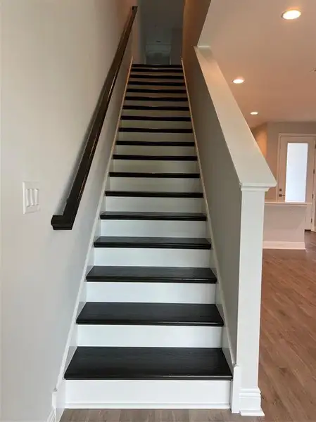 Spacious, unfurnished interior of a new home in The Towns At Long Bayou, Seminole (Image 19).
