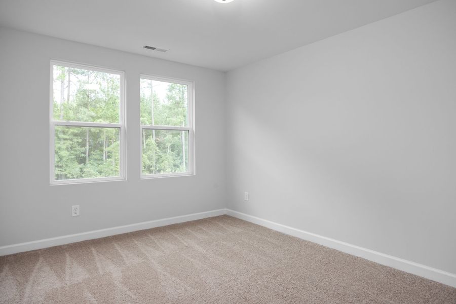Representative unfurnished interior of a home built from the The Warren by Davidson Homes LLC in Gregory Village Townhomes, Lillington (Image 22).
