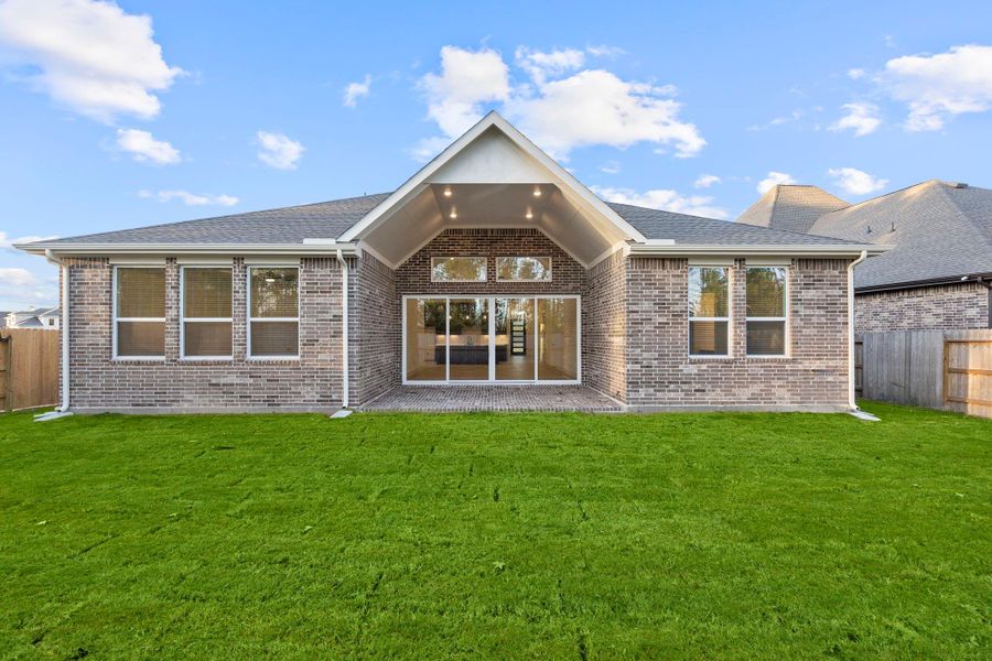 Exterior details and patio area of a home in Evergreen, Conroe (Image 22).