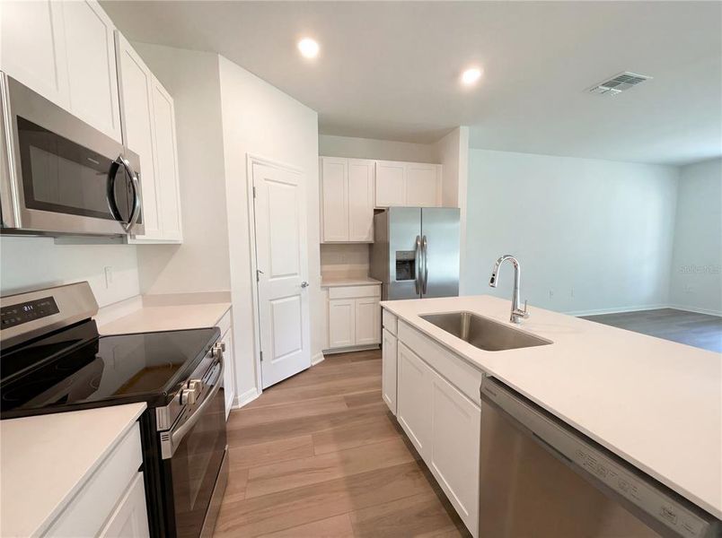 Furnished interior view inside a new home in Grand Park, Dunnellon (Image 9).