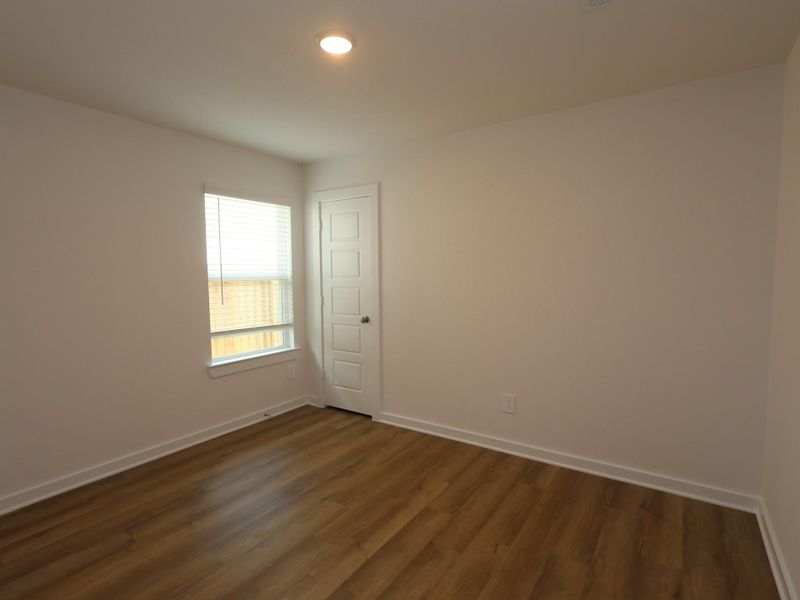 Spacious, unfurnished interior of a new home in Pinewood at Grand Texas, New Caney (Image 13).
