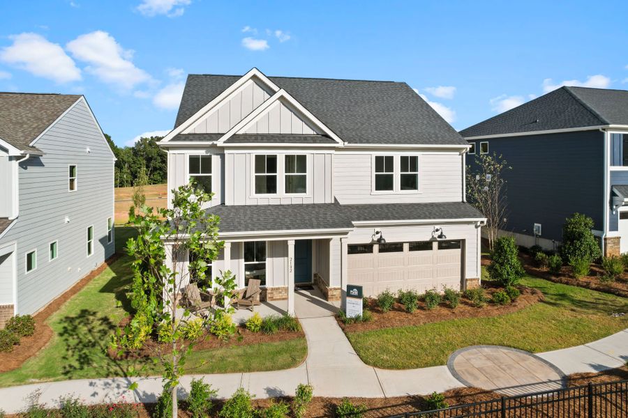 Representative exterior photo of a completed home built from the Marshall by Pulte Homes in The Retreat at Carolina Ridge, Harrisburg, NC (Image 33). Representative exterior photo of a completed home built from the Marshall by Pulte Homes in The Retreat at Carolina Ridge, Harrisburg, NC (Image 33).