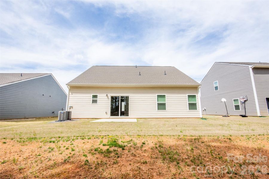 Exterior details and patio area of a home in Colonial Crossing, Troutman (Image 3).