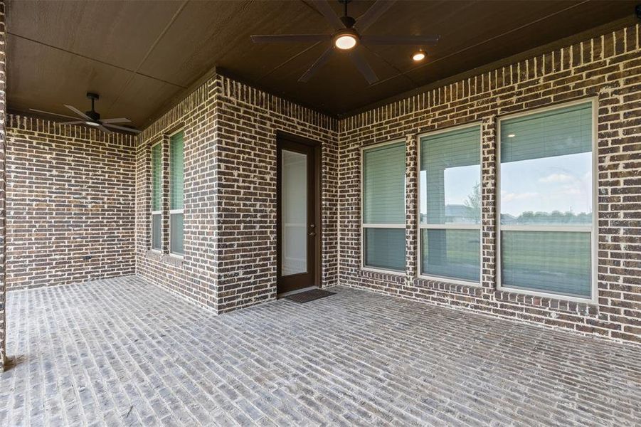View of patio / terrace featuring a ceiling fan View of patio / terrace featuring a ceiling fan
