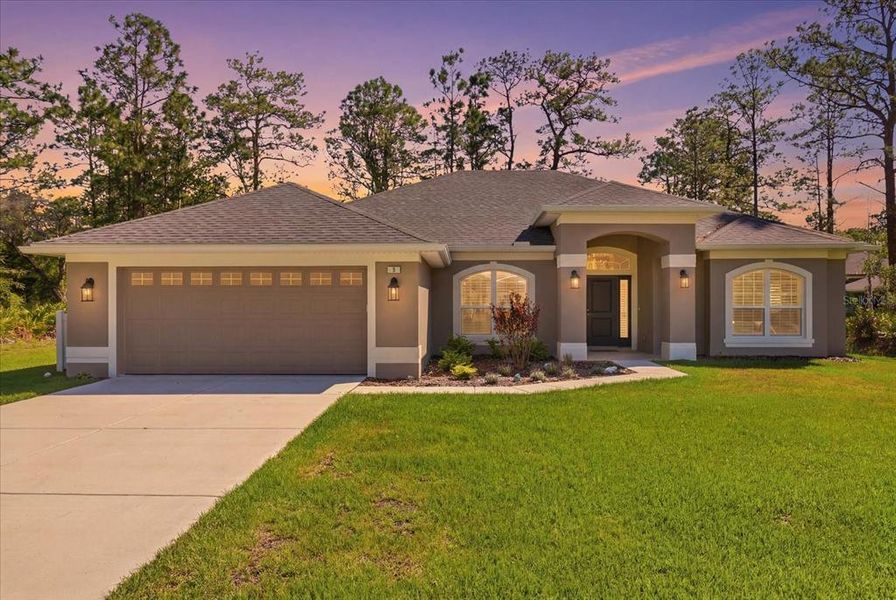 Front exterior of a new home in , Homosassa, FL, highlighting curb appeal (Image 24).