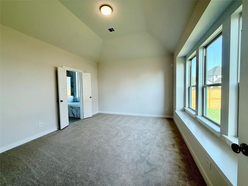 Spacious primary bedroom