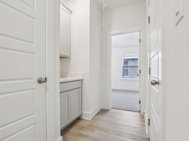 Garage entry in the Callaghan floorplan at a Meritage Homes community.