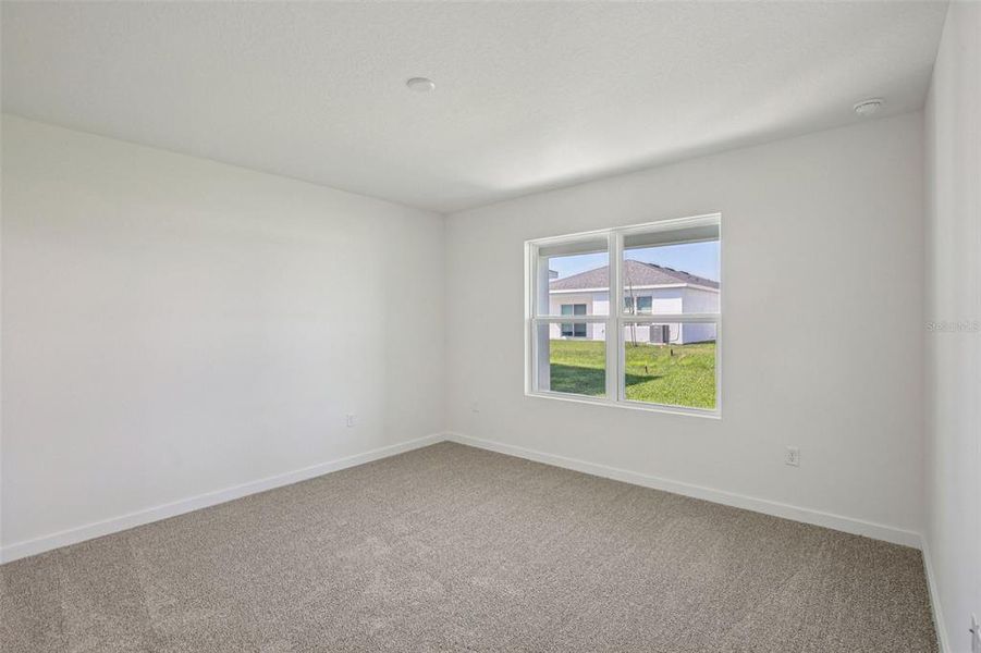 Spacious, unfurnished interior of a new home in Willowbrook North, Winter Haven (Image 21).