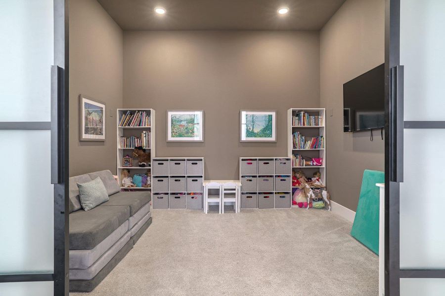 The dedicated media room is ideal for movie nights, gaming, or private relaxation.