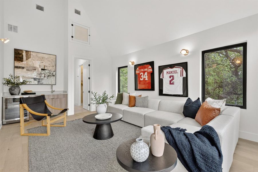 Wine Fridge + Cabinets + Sink for making it easy to host your friends over to watch your favorite sports or movies. Wine Fridge + Cabinets + Sink for making it easy to host your friends over to watch your favorite sports or movies.