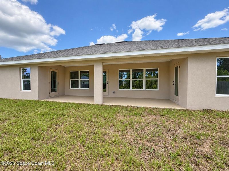 Exterior details and patio area of a home in Palm Bay, Palm Bay (Image 3). Exterior details and patio area of a home in Palm Bay, Palm Bay (Image 3).
