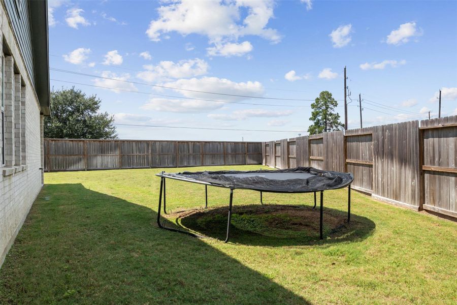 Exterior details and patio area of a home in Raburn Reserve 50s, Tomball (Image 3). Exterior details and patio area of a home in Raburn Reserve 50s, Tomball (Image 3).