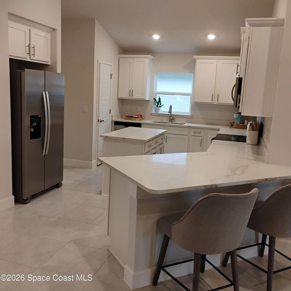 Furnished interior view inside a new home in St. John's Preserve, Palm Bay (Image 4).