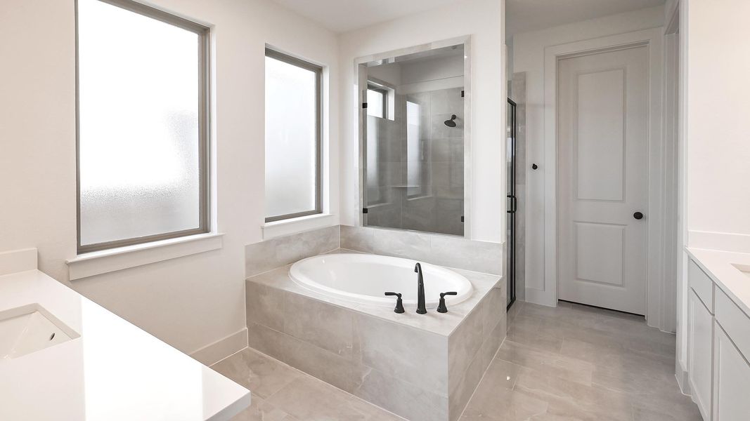 Furnished interior view inside a new home in Crosswinds 50', Kyle (Image 7).