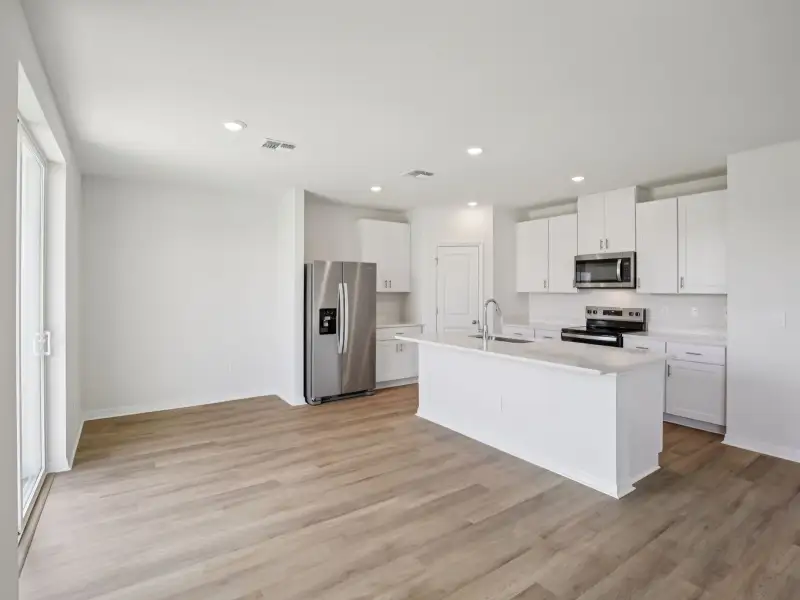 Furnished interior view inside a new home in Oakfield Trails - Premier Series, Parrish (Image 4).
