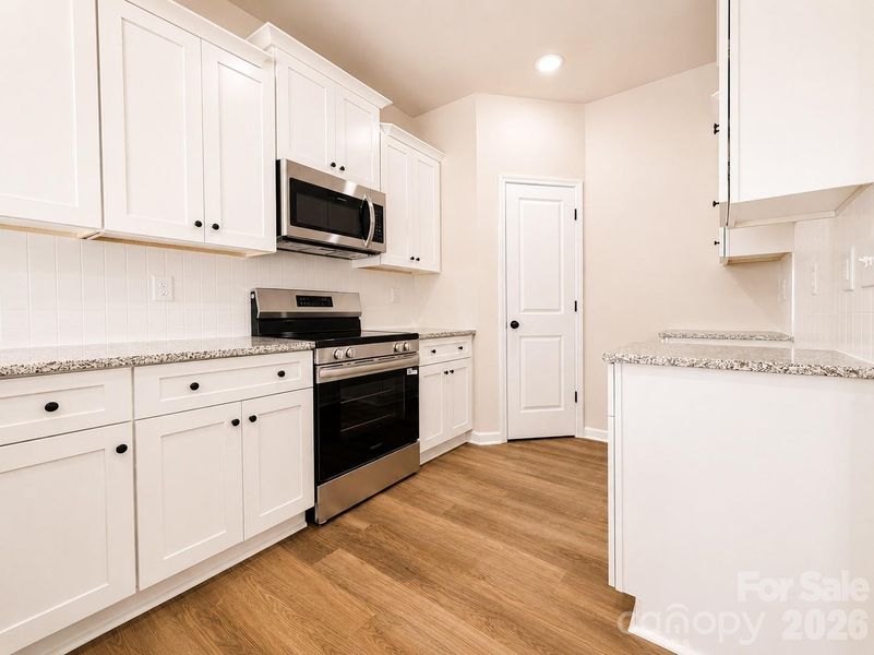 Furnished interior view inside a new home in , Charlotte (Image 3).