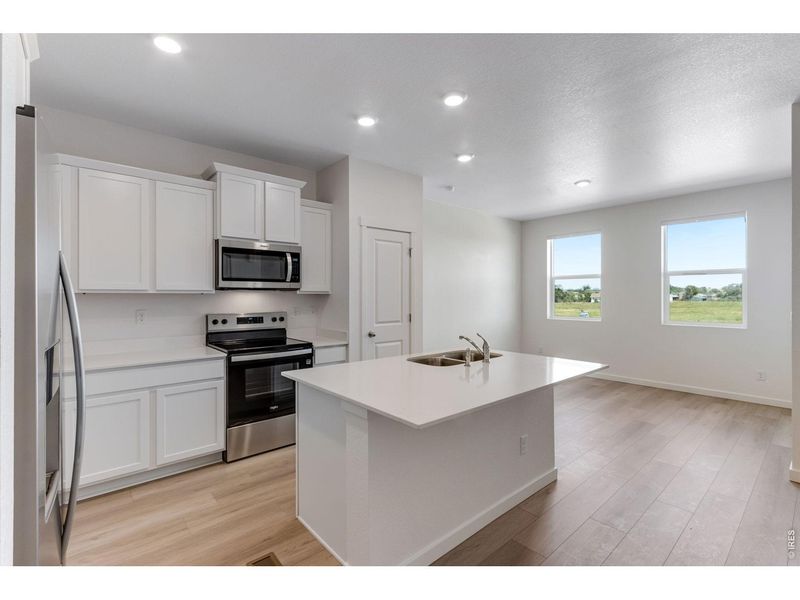 Furnished interior view inside a new home in Vista Meadows, Fort Lupton (Image 5).