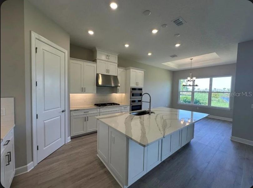 Furnished interior view inside a new home in Center Lake Ranch Community Group Page, St. Cloud (Image 4).