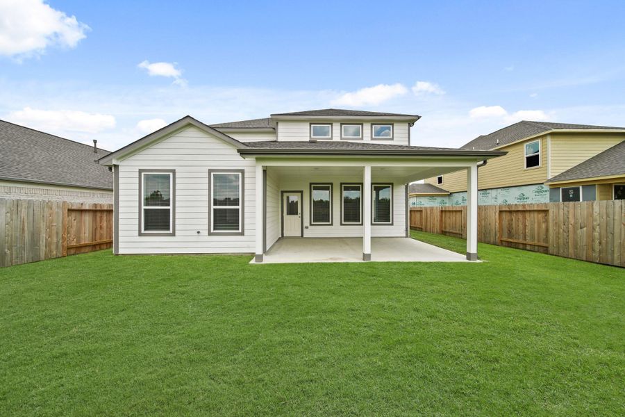 Front exterior of a new home in Beacon Hill, Waller, TX, highlighting curb appeal (Image 17). Front exterior of a new home in Beacon Hill, Waller, TX, highlighting curb appeal (Image 17).