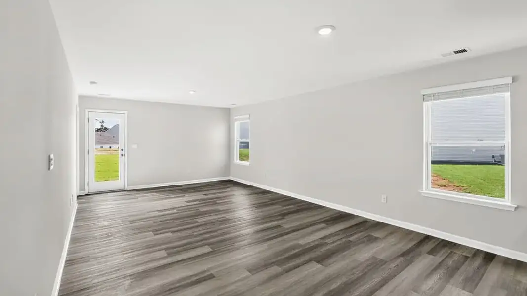 Spacious, unfurnished interior of a new home in Village Grove, Greenville (Image 23).