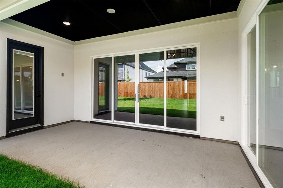 Exterior details and patio area of a home in , Frisco (Image 4).